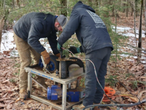 County Pump & Supply technicians diagnosing low well water pressure during a service call