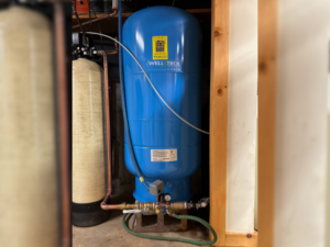 Residential well pressure tank installed as part of a home water system